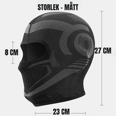 Termisk balaklava från Vinterexperten med svart och grå design. Vindtät och andningsbar ansiktsmask, idealisk för vinteraktiviteter som skidåkning, cykling och vandring i kalla förhållanden.
