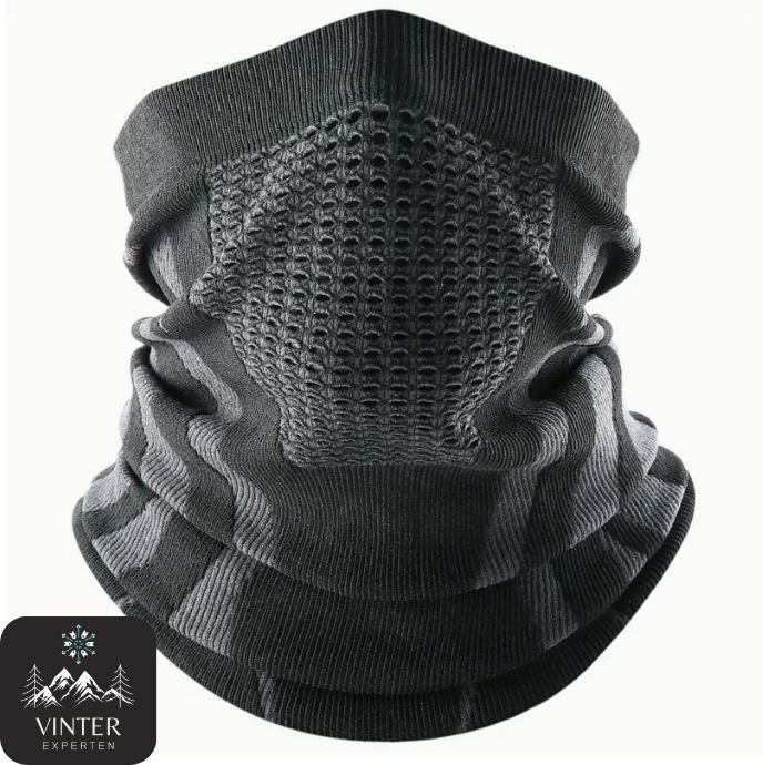 Grå vinter halsduk från Vinterexperten, designad med ventilerande material och ergonomisk passform för värme och komfort under kalla dagar.