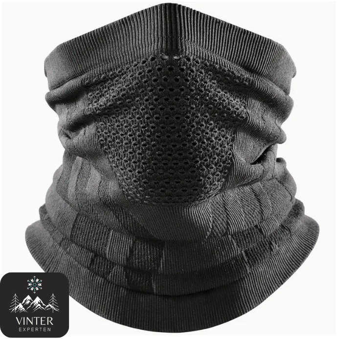 Svart vinterbuff från Vinterexperten, designad med ventilerande material och ergonomisk passform för värme och komfort under kalla dagar.